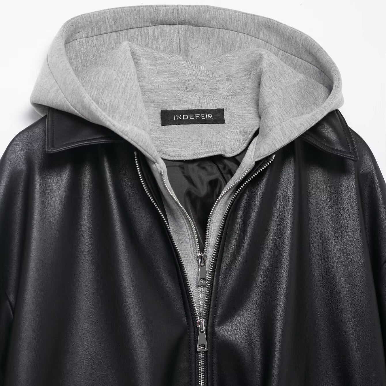 Dames faux lederen jack met contrasterende capuchon