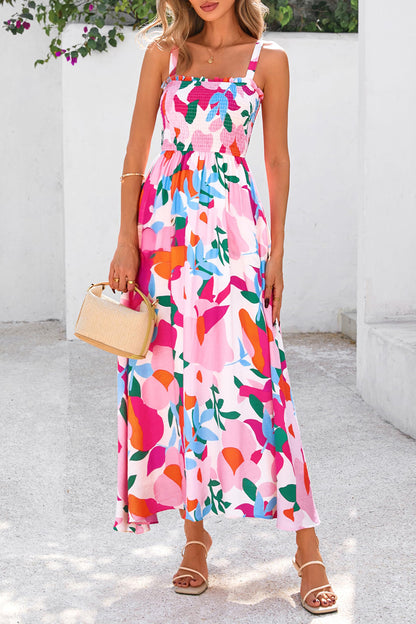 Roze zomerjurk met bloemenprint verstelbare bandjes smokwerk en hoge taille