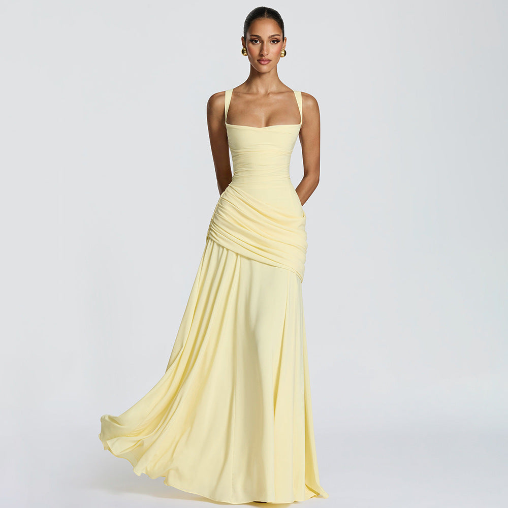 Elegante mouwloze jurk met plooien en wijde rok