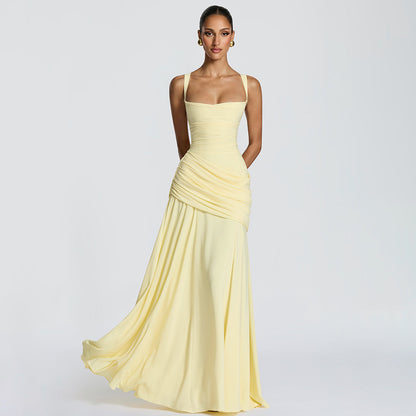 Elegante mouwloze jurk met plooien en wijde rok