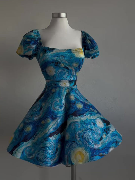 Mini-jurk met pofmouwen en print