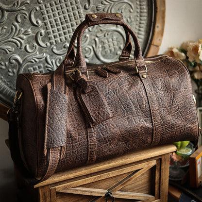 A men's hand-held outdoor camping travel bag made of cowhide