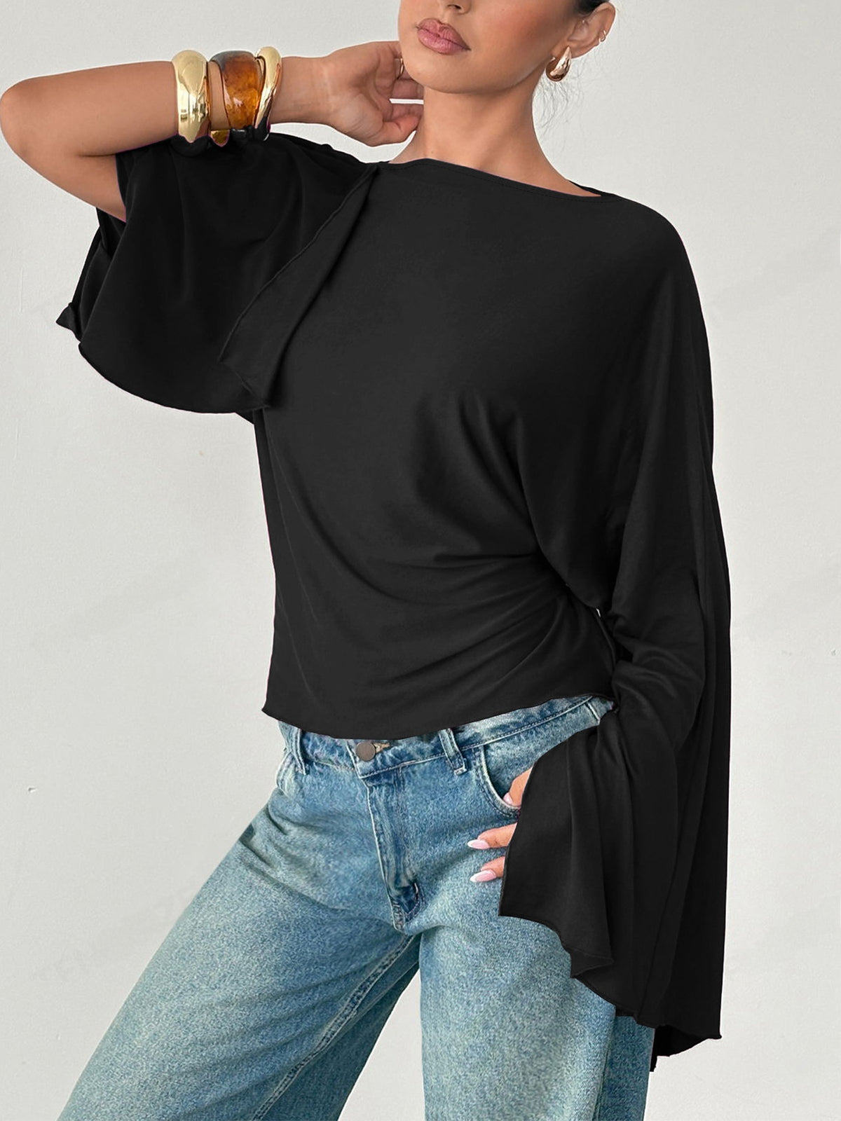 Casual gebreide slim fit top met lange wijde mouwen en strik op de rug