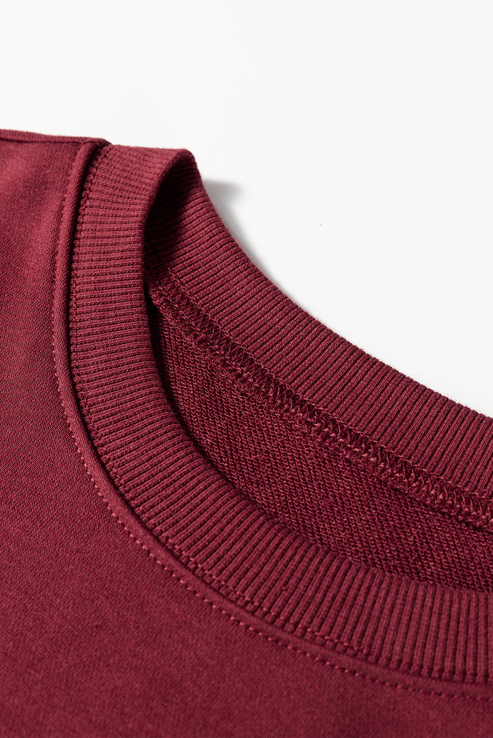 Preppy sweatshirt met strepen op de mouwen en een losse pasvorm