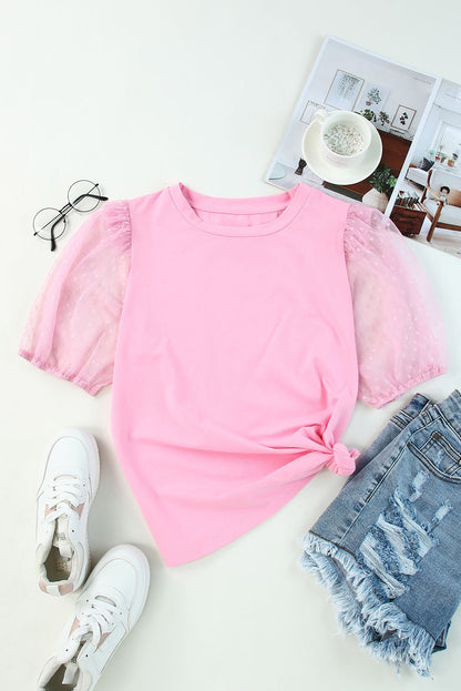 Roze top van tule met pofmouwen