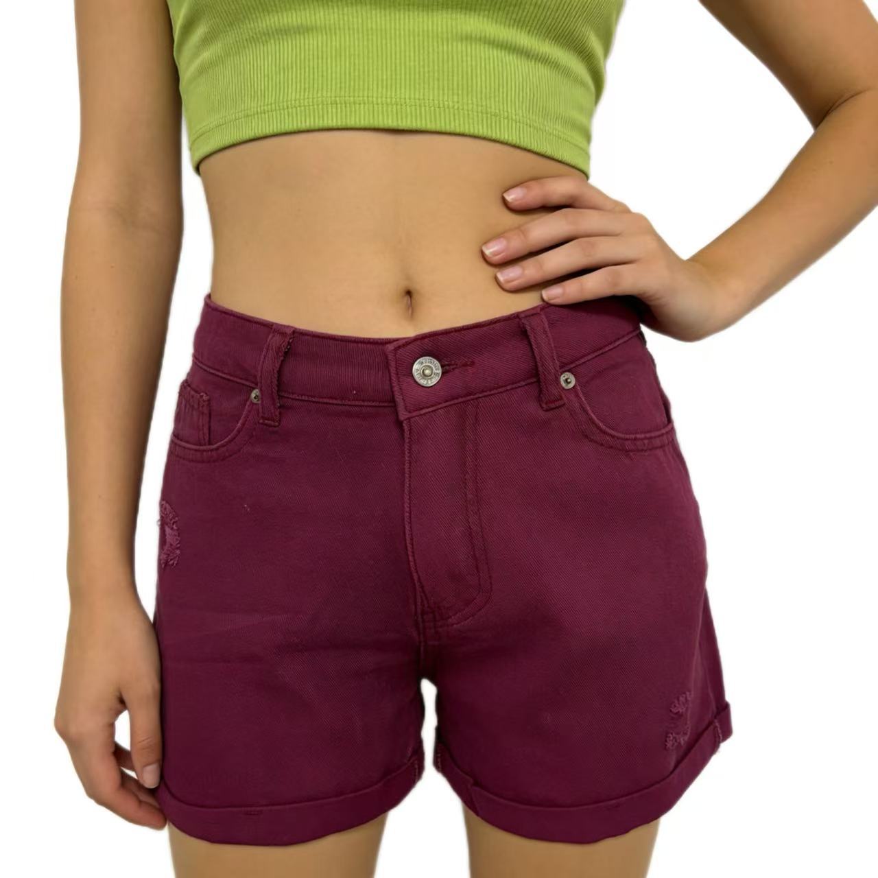 Women's Denim Shorts with Ripped Details and Tassels
