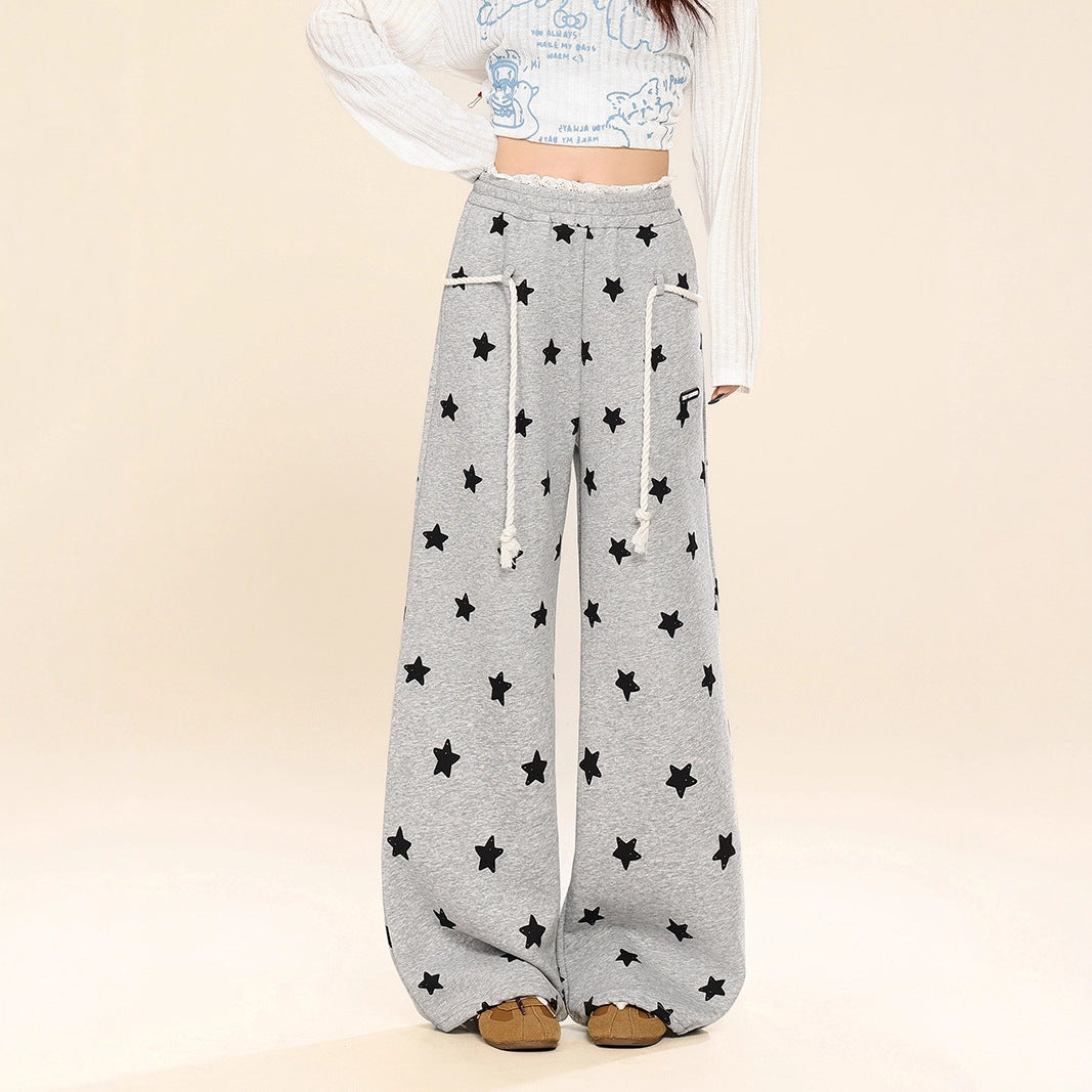 Dames joggingbroek met all-over sterren print wijde pijpen in een relaxte stijl
