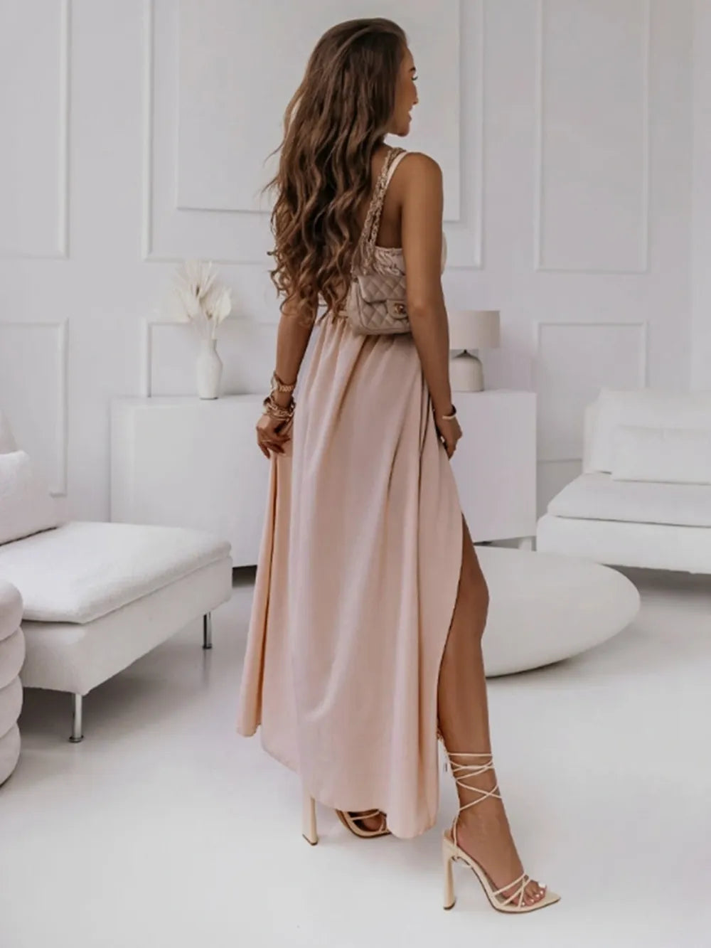 Elegante maxi-jurk met V-hals split en spaghettibandjes