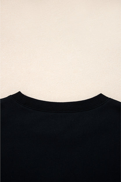 Preppy sweatshirt met strepen op de mouwen en een losse pasvorm