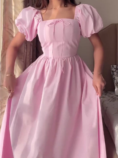 Maxi-jurk met pofmouwen en strik