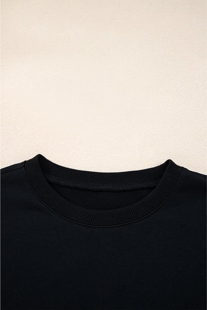 Preppy sweatshirt met strepen op de mouwen en een losse pasvorm