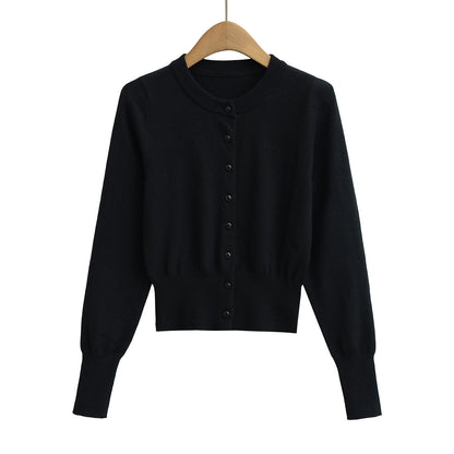 Vest met ronde hals knopen en lange mouwen