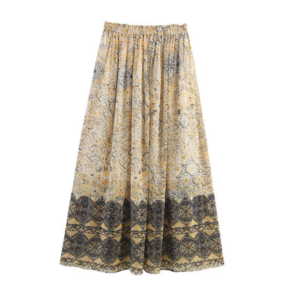 Elegant vormgegeven shirttop of midi-rok met print