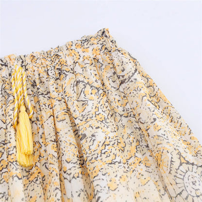 Elegant vormgegeven shirttop of midi-rok met print