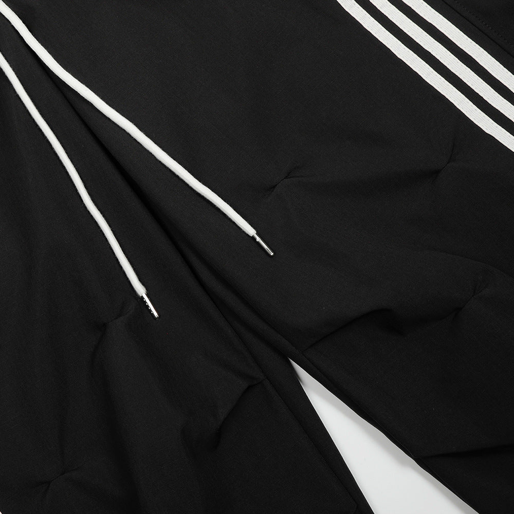 Sportpak met drie strepen voor heren jasje met opstaande kraag en broek met wijde pijpen