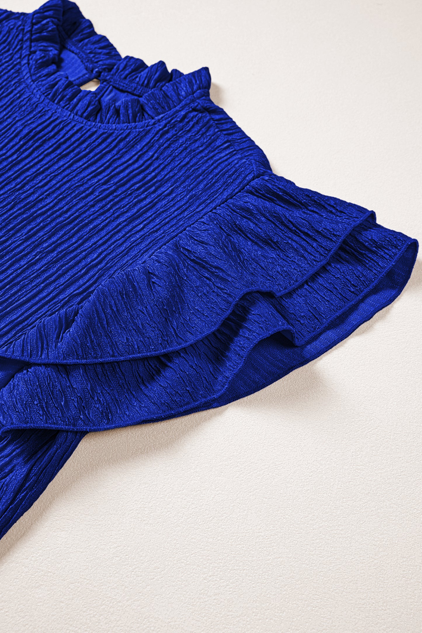 Effen blouse met textuur en ruches korte mouwen