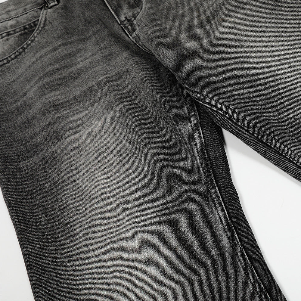 Washed and ground white distressed jeans