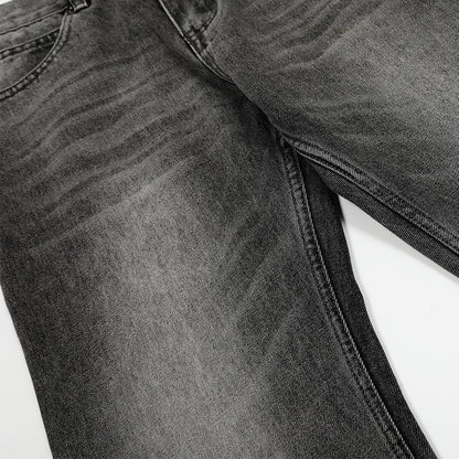 Washed and ground white distressed jeans