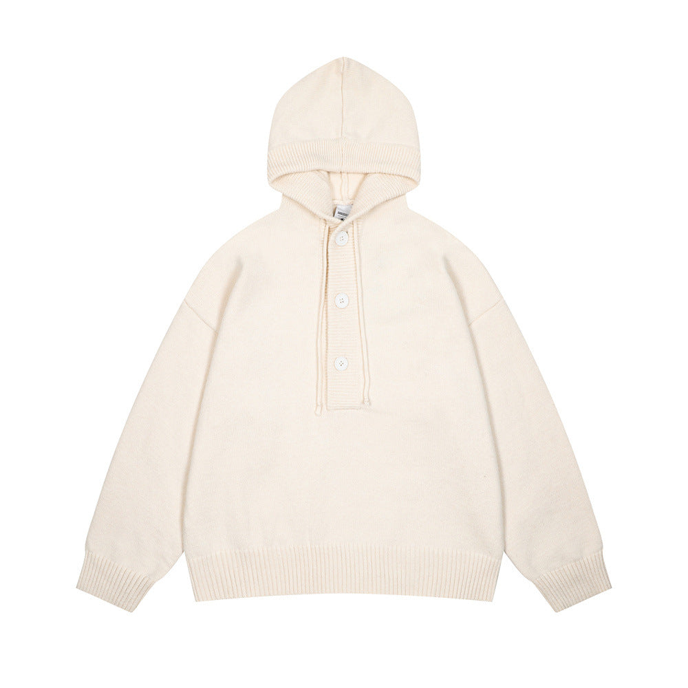 Tui met halve knoopsluiting en capuchon