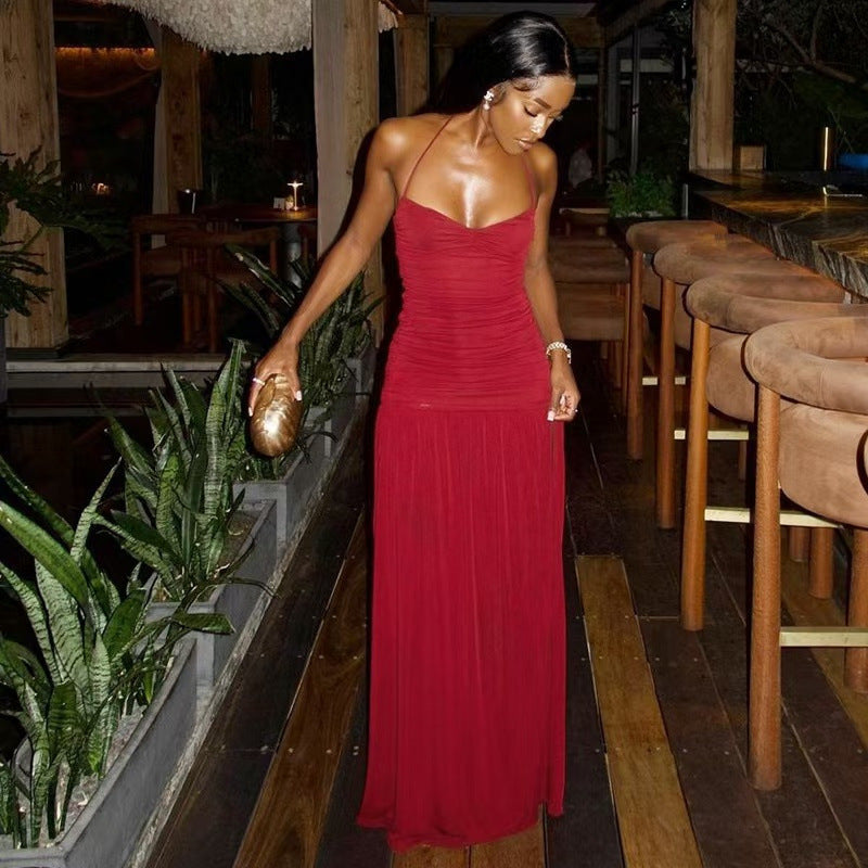Hanging neck slim fit exposed backpack hip side slit jumpsuit long skirt