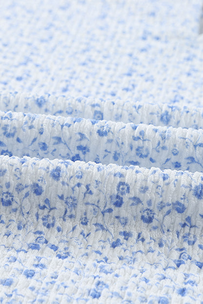 Blouse met bloemenprint open rug en gesmokte pofmouwen