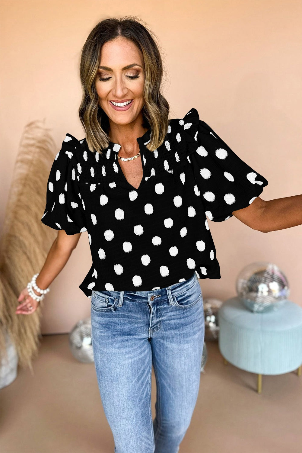 Blouse met stippenprint gesmokte halslijn en korte ballonmouwen