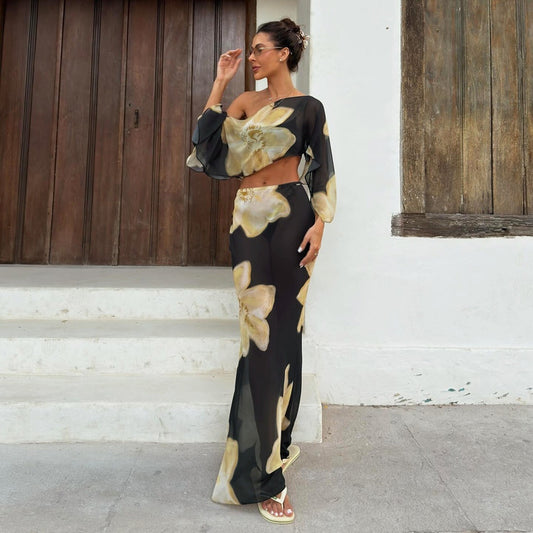 Set bestaande uit een crop top met bloemenprint één schouder en een rok met hoge taille