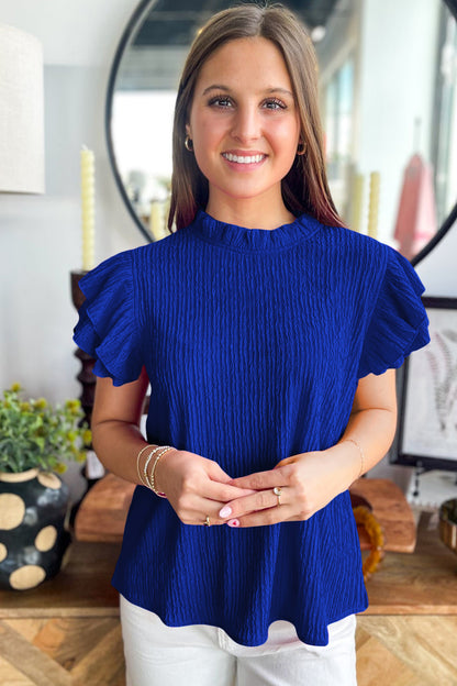 Effen blouse met textuur en ruches korte mouwen