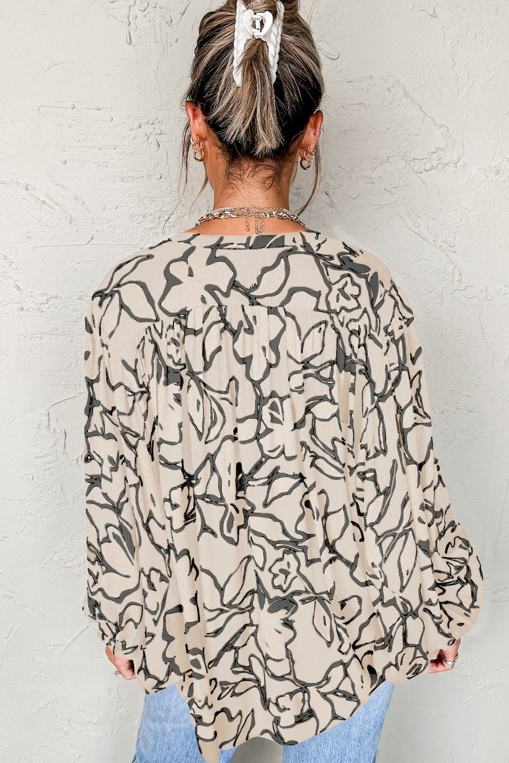 Losse blouse met bloemenprint vleermuismouwen en knoopsluiting