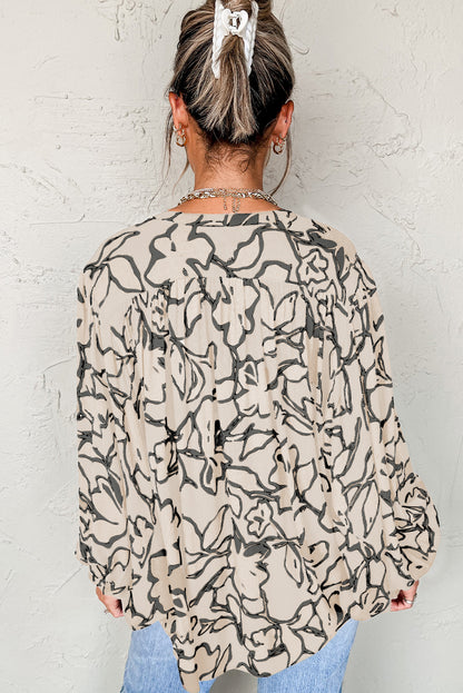 Losse blouse met bloemenprint vleermuismouwen en knoopsluiting