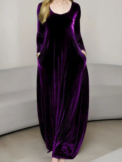 Effen velours damesjurk met lange mouwen en zakken