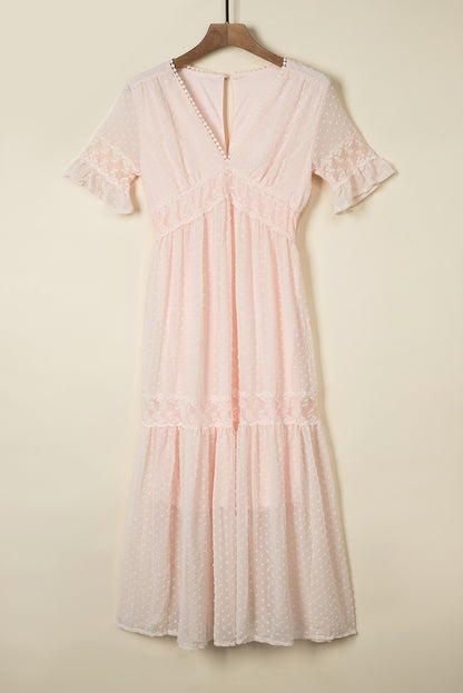 Maxi-jurk met Zwitserse stippen en kanten afwerking
