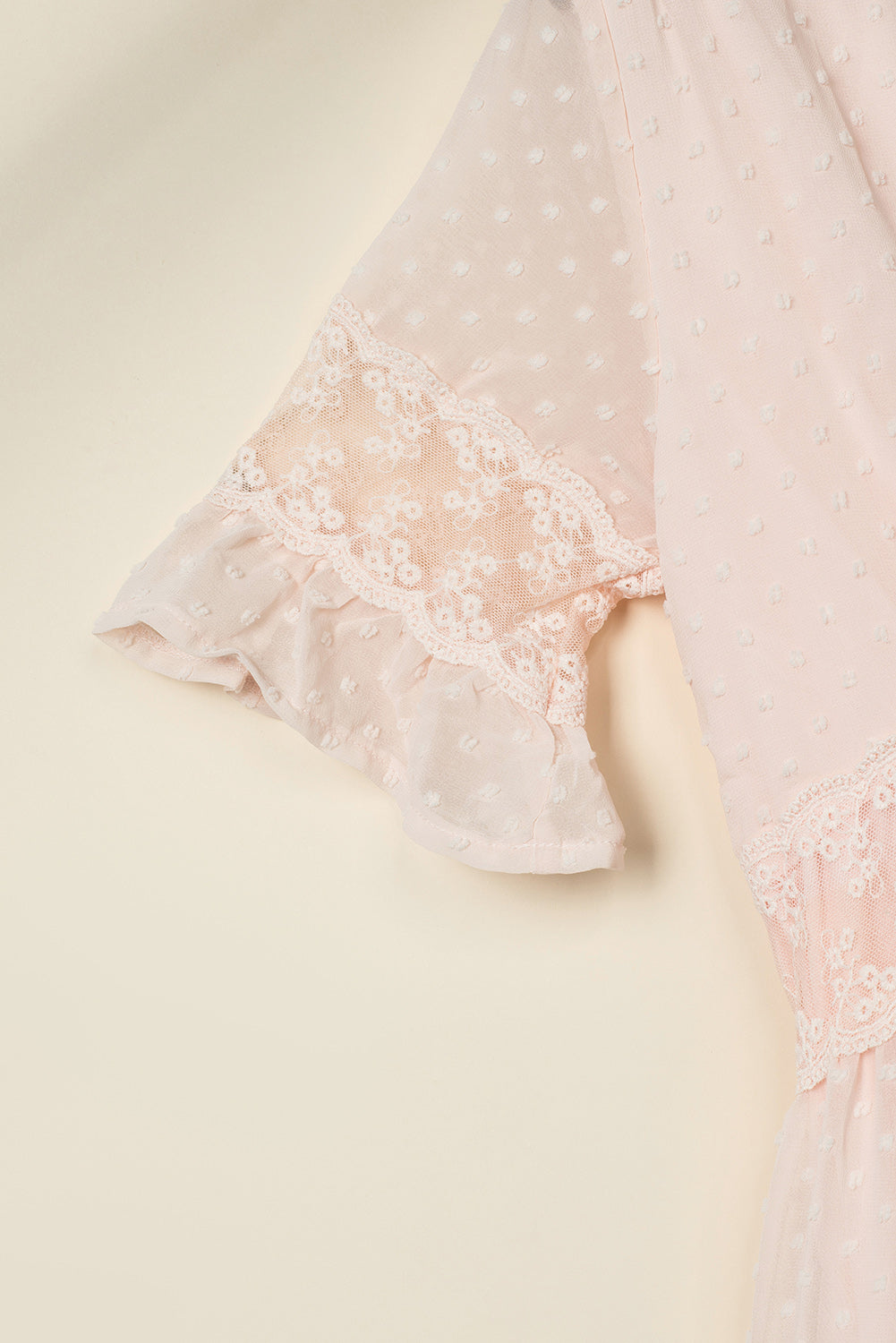Maxi-jurk met Zwitserse stippen en kanten afwerking