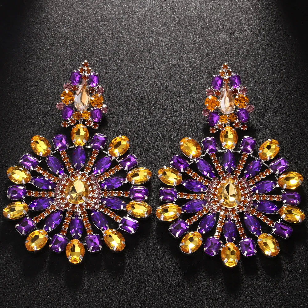 Holle kristallen oorbellen met opvallende hangers