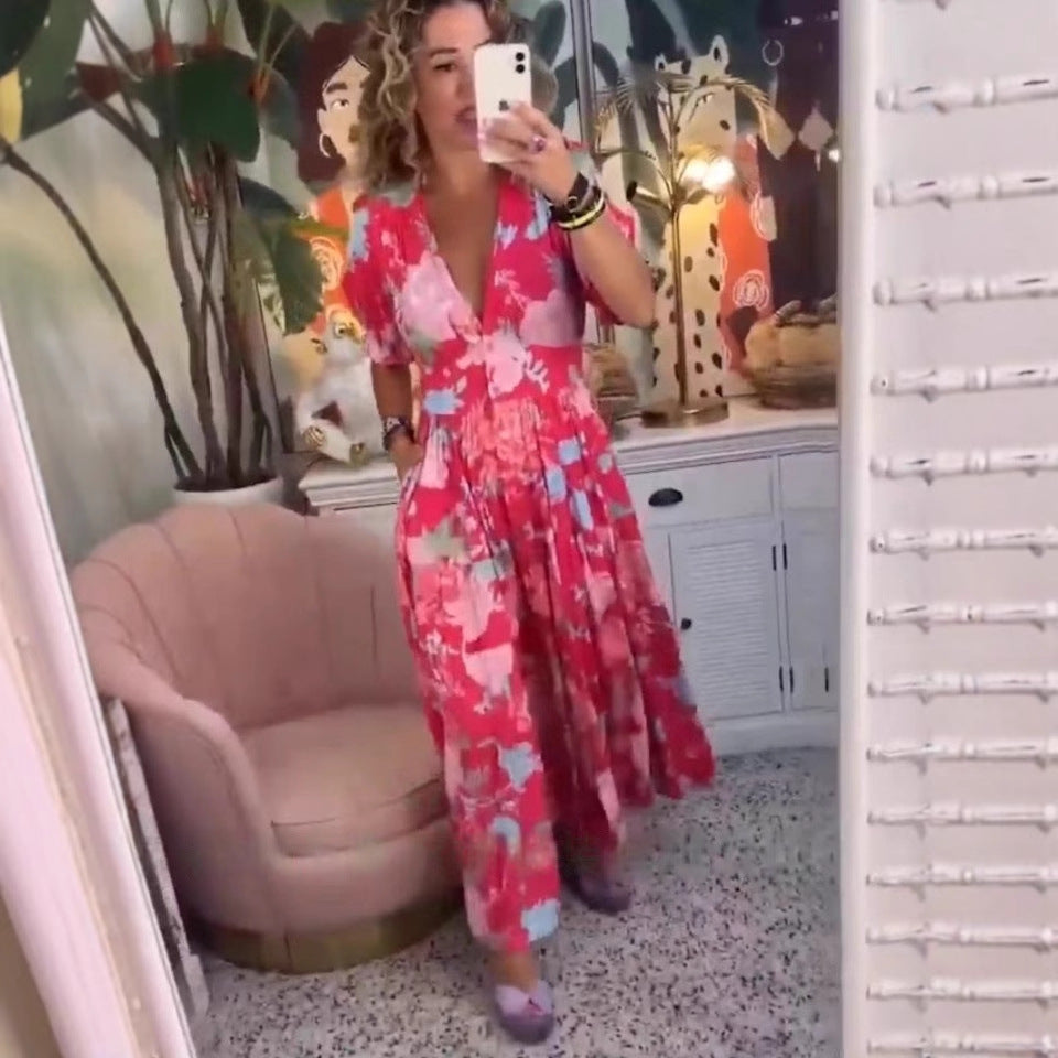 Lange jurk met bloemenprint en V-hals en elastische taille