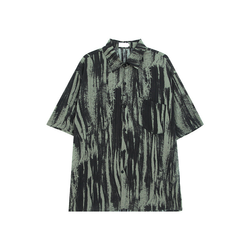 Stijlvolle oversized overhemd met korte mouwen en inktspatpatroon