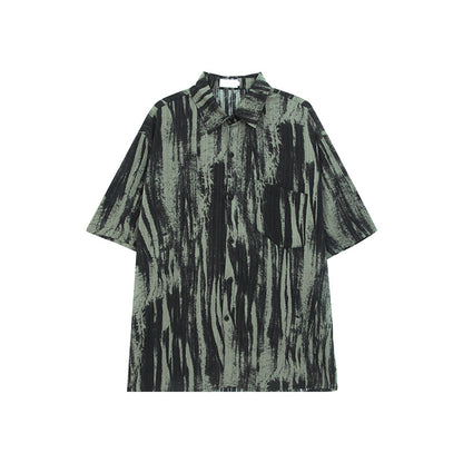 Stijlvolle oversized overhemd met korte mouwen en inktspatpatroon