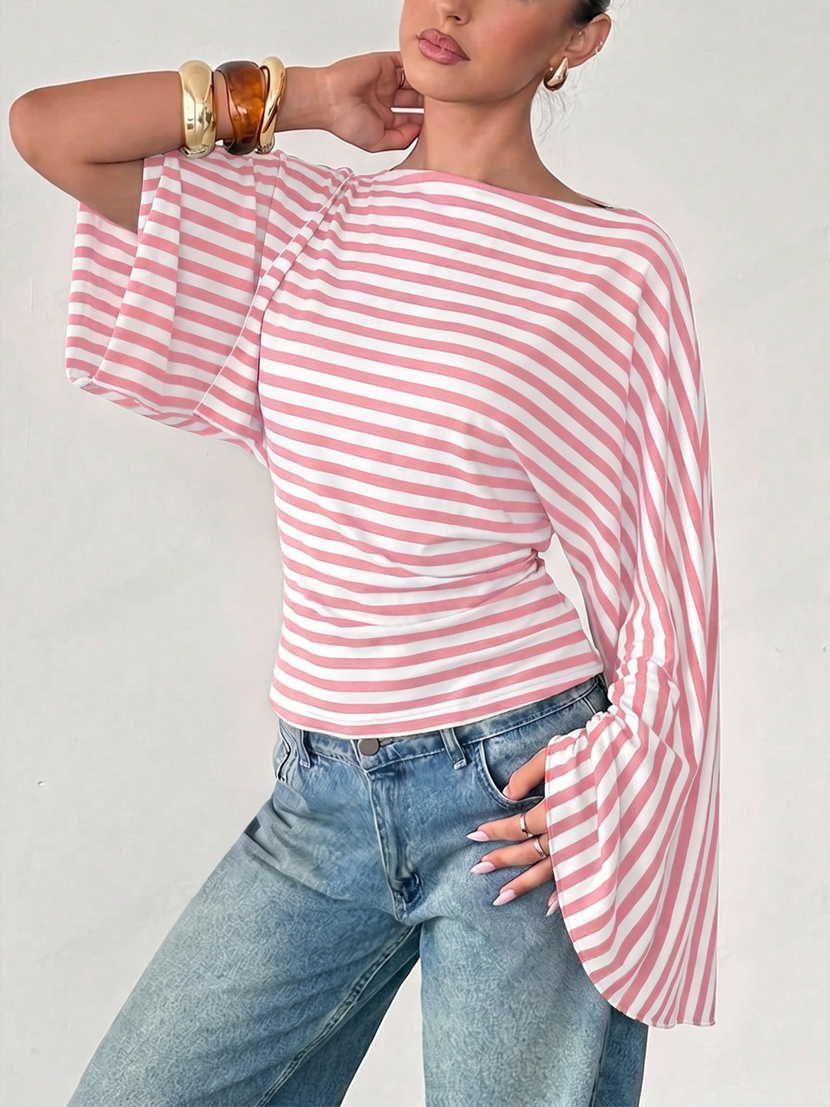 Casual gebreide slim fit top met lange wijde mouwen en strik op de rug