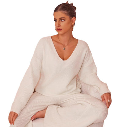 Gebreid geborsteld pak met lange mouwen en verzonken strepen