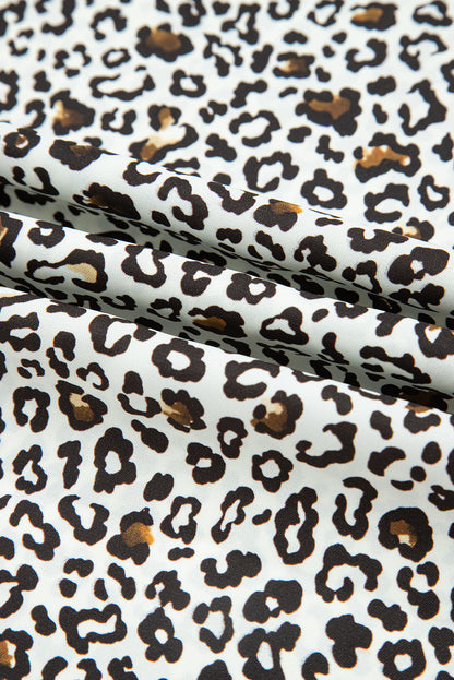 Plus size mini-jurk met knoopsluiting V-hals luipaard of bloemenprint losse pasvorm