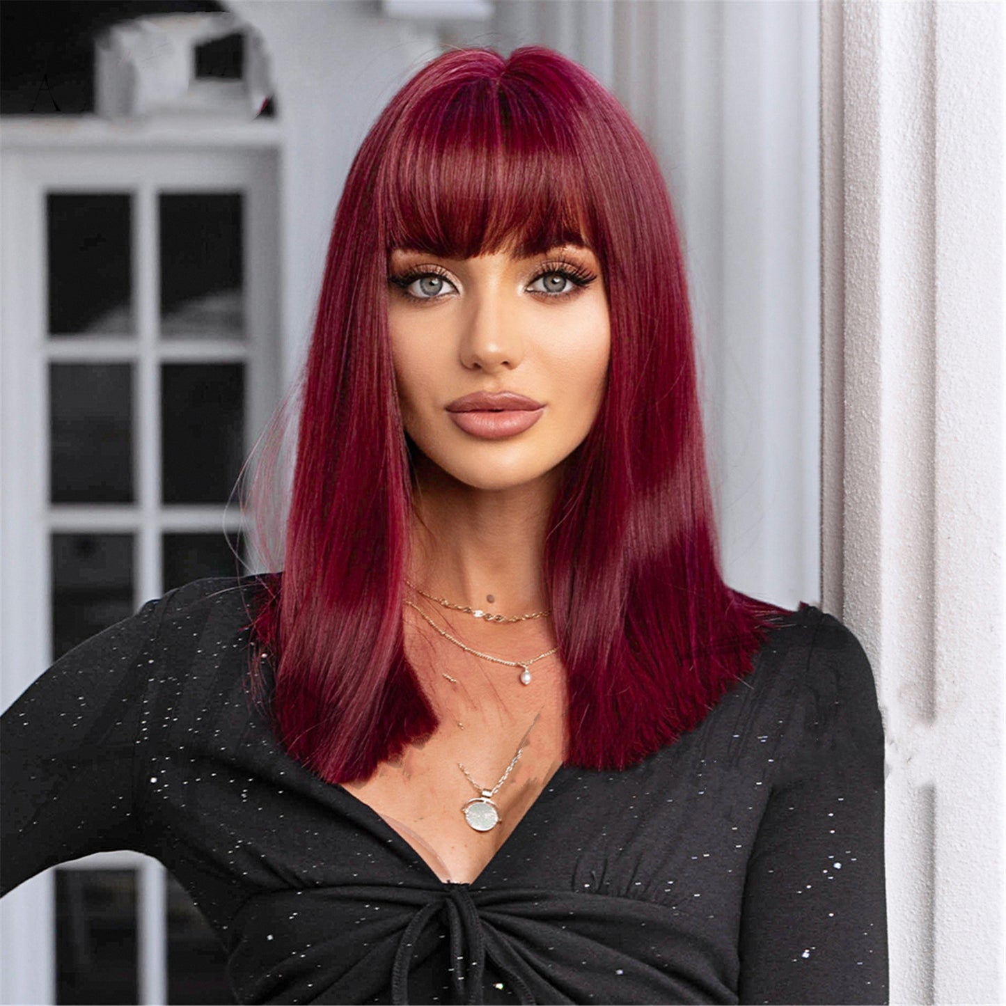 Synthetische steil haar pruik met pony