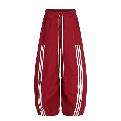 Sportpak met drie strepen voor heren jasje met opstaande kraag en broek met wijde pijpen