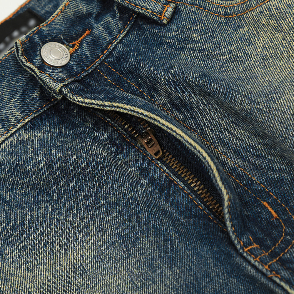 Color blocked yellow mud dyed washed denim jeans
