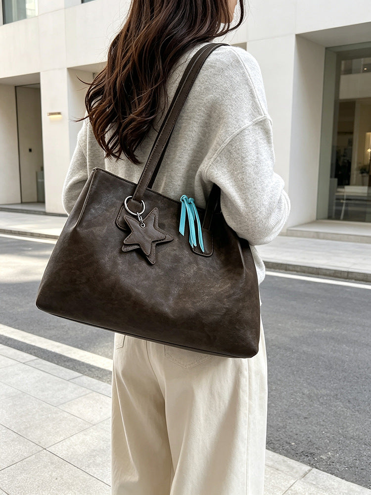 Star pendant tote shoulder bag