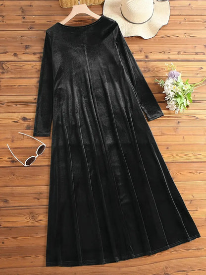 Effen velours damesjurk met lange mouwen en zakken