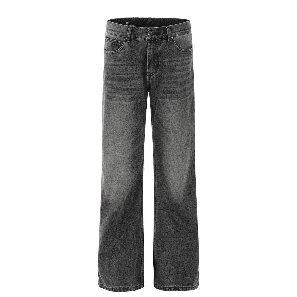 Washed and ground white distressed jeans