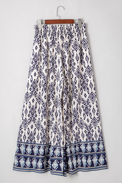 Blauwe broek met etnische print hoge taille en wijde pijpen losse pasvorm