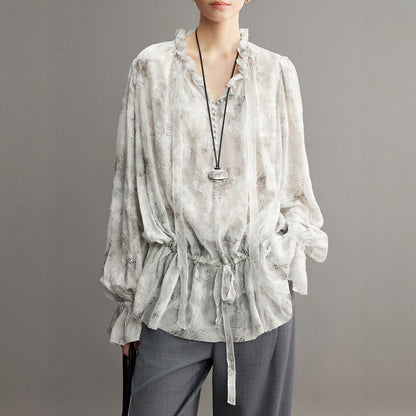 Modieuze lente/zomer blouse met bloemenprint ruches  V-hals en strikceintuur