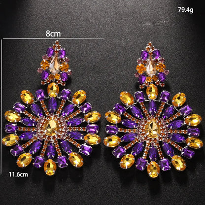 Holle kristallen oorbellen met opvallende hangers