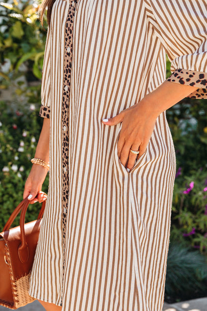 Gestreepte jurk met knopen en luipaardprint